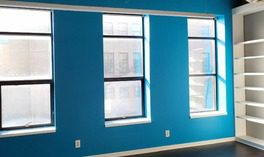 Office conference room with bight blue paint